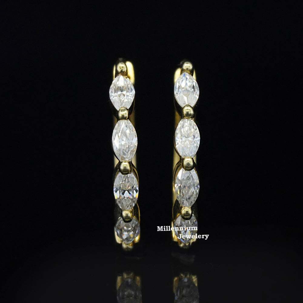 https://cdn.shopify.com/s/files/1/0571/2825/5601/files/moissaniteearrings.jpg?v=1745059078