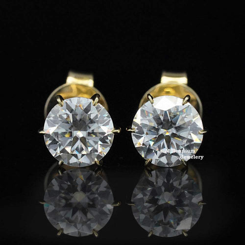 https://cdn.shopify.com/s/files/1/0571/2825/5601/files/moissaniteearrings1_1f6b9b00-0fdc-46b0-be7b-40312e9561ca.jpg?v=1745058694