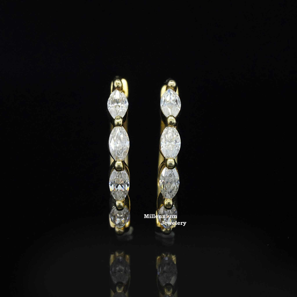 https://cdn.shopify.com/s/files/1/0571/2825/5601/files/moissaniteearrings1_460a8e51-1a23-4521-b7ec-c4c4dac7bb0b.jpg?v=1745059075