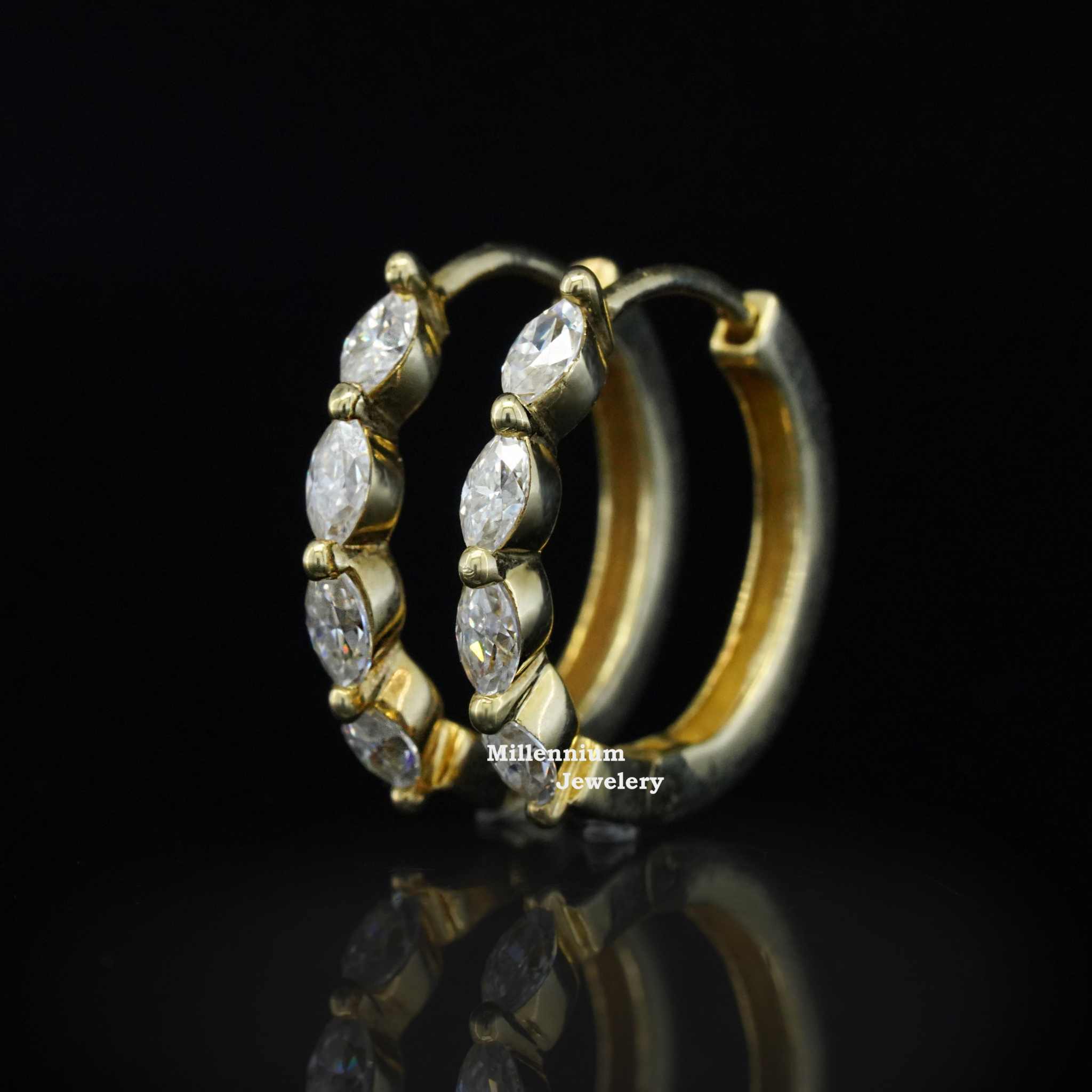 https://cdn.shopify.com/s/files/1/0571/2825/5601/files/moissaniteearrings2_03a27c1f-e83a-413f-9cd5-da74319abd18.jpg?v=1745059075